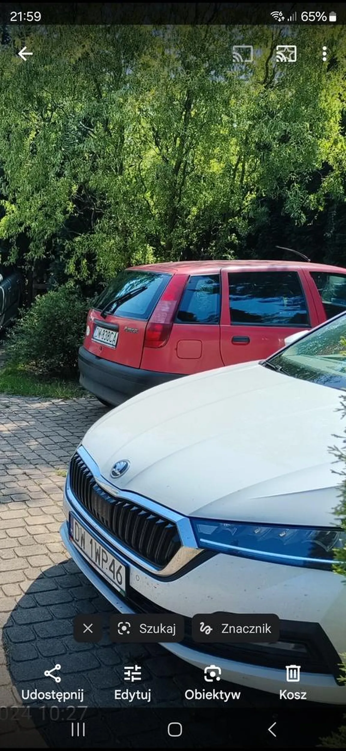 witold skoryk rysune auta na parkingach